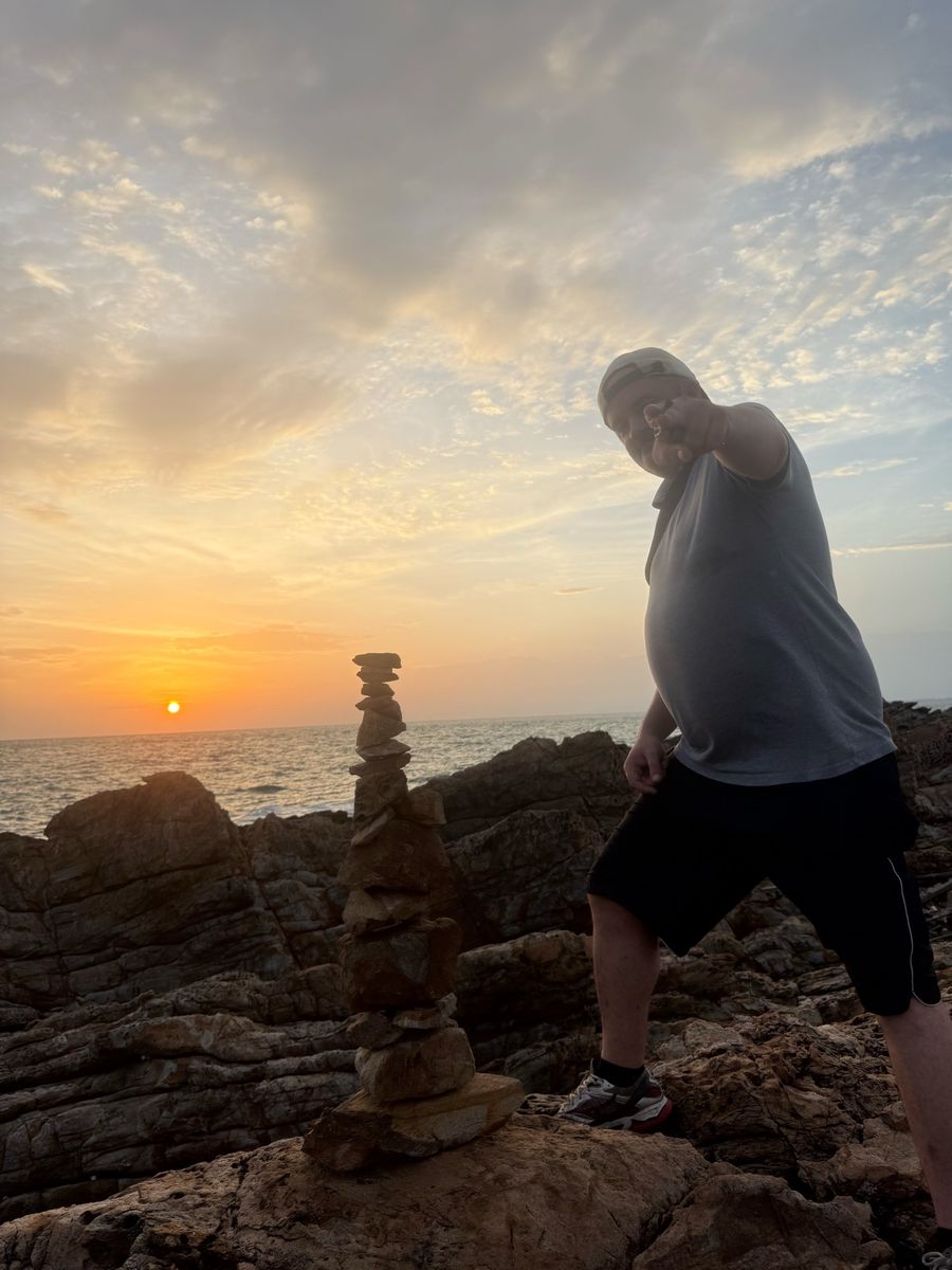 Happy guest at sunset
