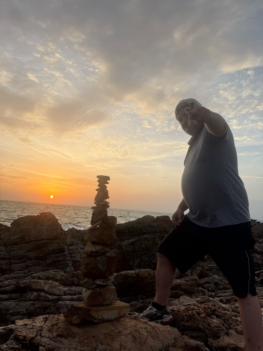 Pointing at the sunset