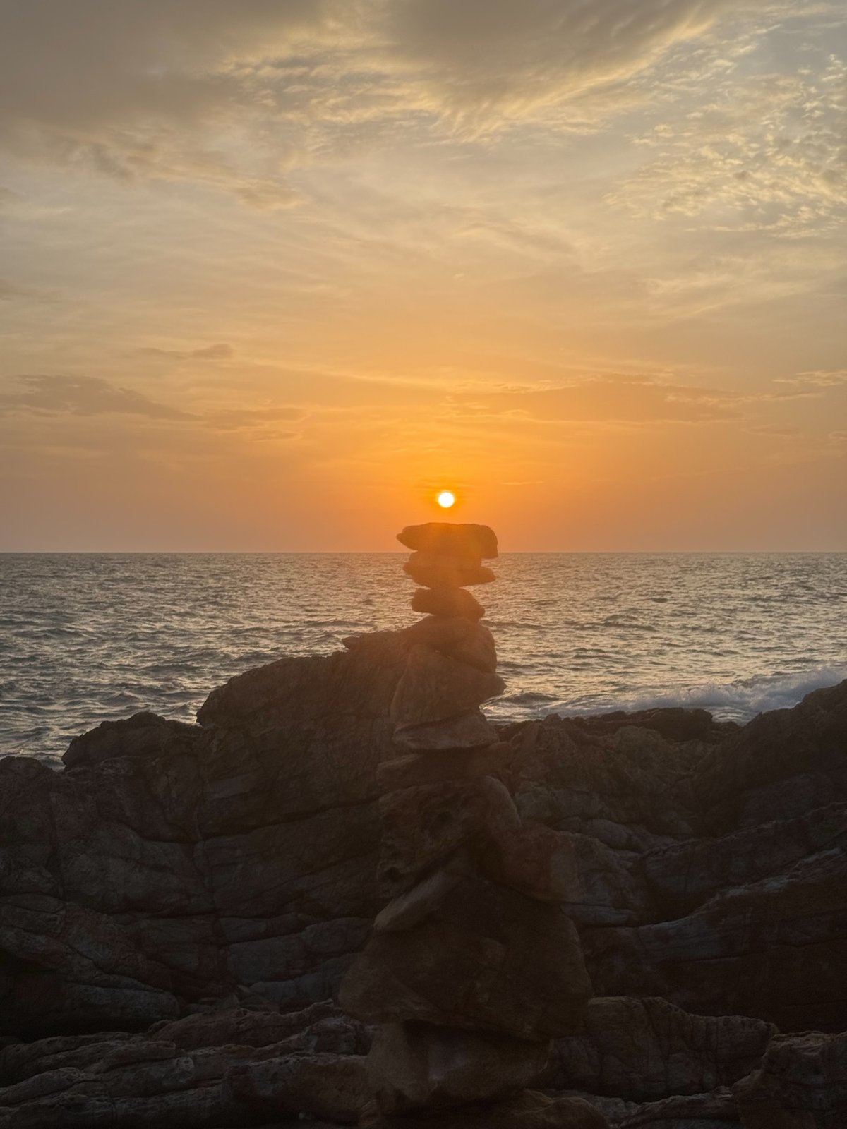 Sunset on stacked stones